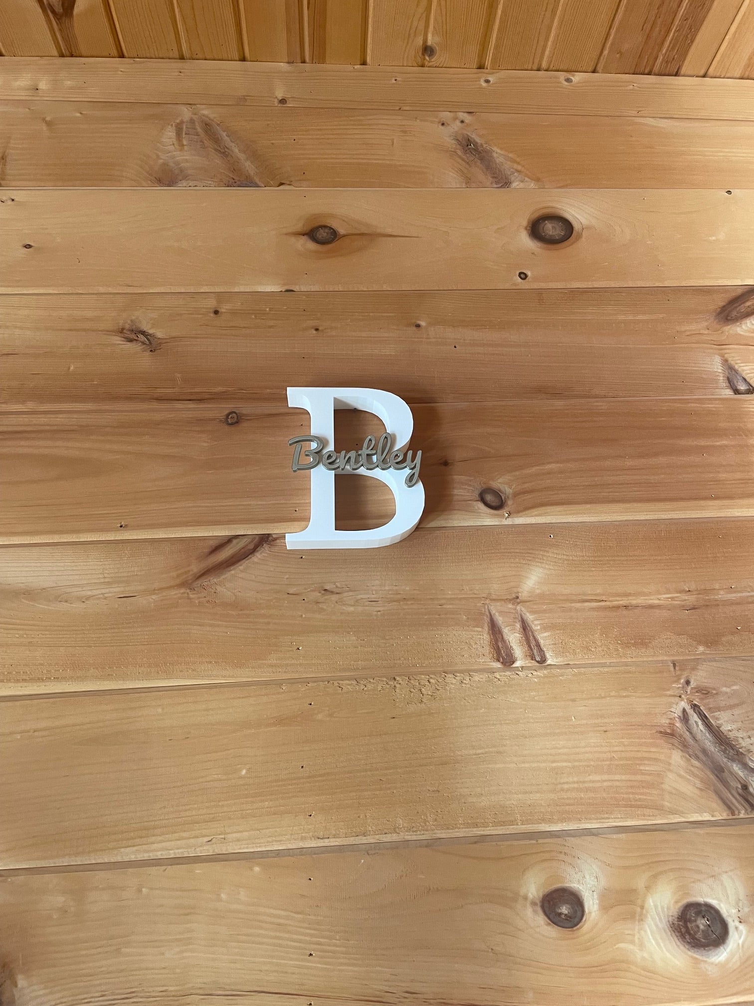 Large first initial and name printed on top